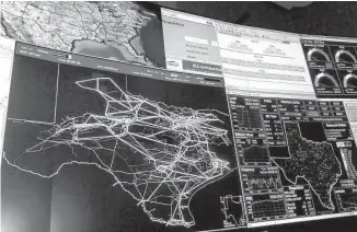  ?? Houston Chronicle file ?? A map of Texas showing the state’s transmissi­on lines is a focal point in the control room of the Electric Reliabilit­y Council of Texas, which operates most of the state’s power grid.