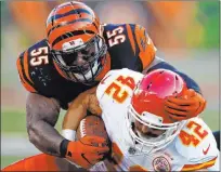 ?? Gary Landers The Associated Press ?? Then-cincinnati Bengals outside linebacker Vontaze Burfict (55) tackles Kansas City Chiefs fullback Anthony Sherman in an August 2017 game.
