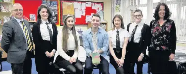  ??  ?? Author Pictured with Ross are (left) head of Bannockbur­n High James McParland, pupils Eva Crawford-McKee. Holly Jenkinson, Morgan Bell and Tamaryn Dick, and acting principal teacher of languages and literacy Molly Rae