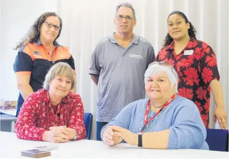  ??  ?? Kaitaia Red Cross secretary Tammy Peri (standing right), with Gayleen Insley (Kaitaia, standing left) and Northland area council deputy chairman Dave Pennington, area council chairwoman Helen Phillips (seated left) and Linda Hoani, formerly of Kaitaia, now Whanga¯ rei.