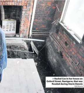  ?? Rob Browne ?? > Rachel Cox in her house on Oxford Street, Nantgarw, that was flooded during Storm Dennis