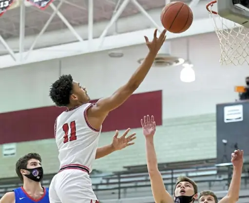  ?? Matt Freed/Post-Gazette ?? Sheldon Cox drives to the basket against Chartiers Valley in this Feb. 12 file photo. Cox led New Castle with 18 points Friday night.