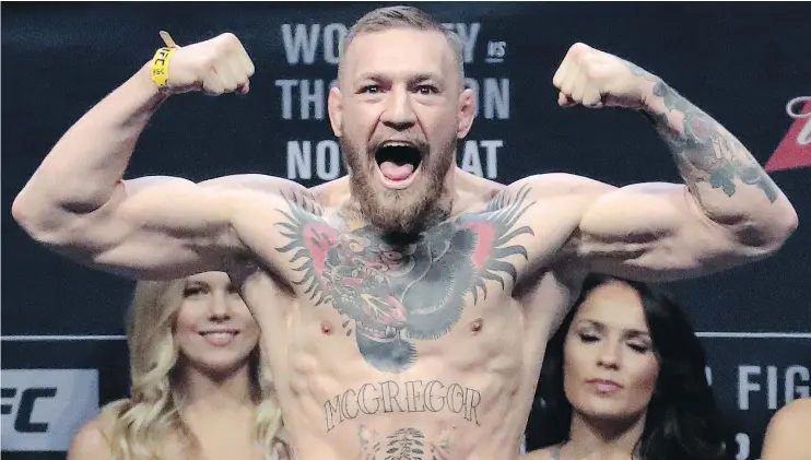  ?? — THE ASSOCIATED PRESS FILES ?? Without Conor McGregor fighting to draw in viewers, the Ultimate Fighting Championsh­ip’s pay-per-view event buy rates are way down this year.