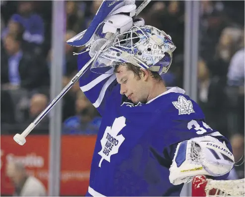  ?? DAVE ABEL / TORONTO SUN / POSTMEDIA NETWORK ?? Toronto Maple Leafs goaltender James Reimer regroups after a goal by the Columbus Blue Jackets on Wednesday
in Toronto. With the 3-1 loss, the Leafs ended the first half of their NHL season with a 16-18-7 record.