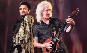  ?? Charles Sykes / Invision / Associated Press ?? Adam Lambert, left, and Brian May, of Queen, perform at the Global Citizen Festival in New York on Sept. 28, 2019.