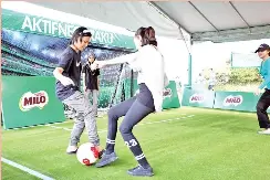  ??  ?? Kids enjoying a game of futsal, one of the many activities at the Milo Malaysia Breakfast Day 2018 held in Kota Kinabalu.