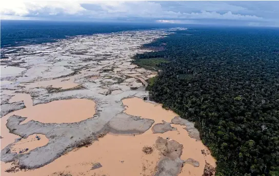  ?? PHOTOS: AP ?? An area lays deforested by illegal gold mining in the Madre de Dios province of Peru, one day before Pope Francis arrives to Peru’s Amazon.