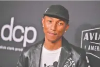  ?? PHOTO BY RICHARD SHOTWELL/INVISION/AP ?? Pharrell Williams appears at the 23rd annual Hollywood Film Awards in Beverly Hills, Calif., in November 2019.