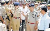  ?? MANOJ YADAV/HT ?? ADG (Lucknow zone) Rajiv Krishna, who is heading the SIT, talking to police officials in Unnao village on Wednesday.