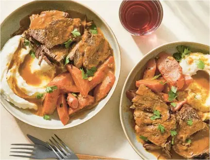  ?? JULIA GARTLAND/THE NEW YORK TIMES PHOTOS ?? Brisket or chuck can be used for a beef stew made like traditiona­l pot roast, such as this Jewish American pot roast, with lots of onions and carrots.