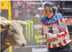  ?? ROBERTO E. ROSALES/JOURNAL ?? Seth “Shorty” Gorham keeps his eyes on a charging bull to avoid being gored on Friday at the Ty Murray PBR event at the Pit.