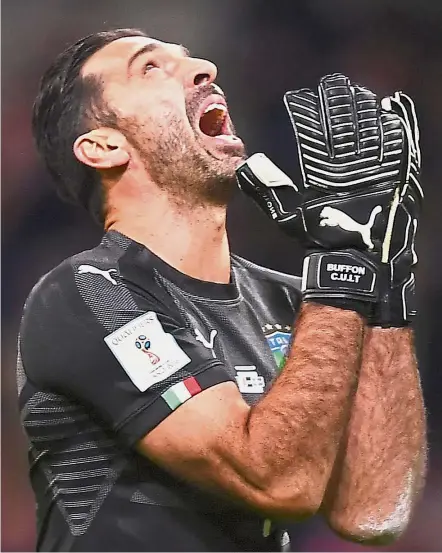  ??  ?? Mental anguish: Goalkeeper Gianluigi Buffon screaming in pain after Italy’s failure to qualify for the 2018 World Cup on Monday. — AFP