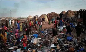  ?? Photograph: Michele Cattani/AFP via Getty Images ?? Refugees in the Faladie camp in Bamako, Mali, pictured on 2 April.