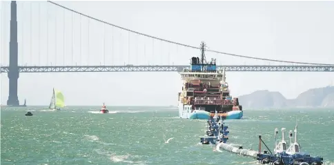  ?? — AFP photo ?? Ocean Cleanup’s System 001 is towed out of the San Francisco Bay in San Francisco.