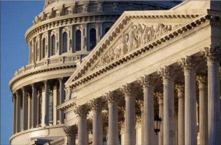  ?? J. SCOTT APPLEWHITE — THE ASSOCIATED PRESS FILE ?? The Capitol in Washington at sunrise. The coming battle over a Supreme Court nominee promises to be a bruising one. The stakes are enormous, and advocacy groups that don’t have to unveil their donors are spending heavily to shape the fight.