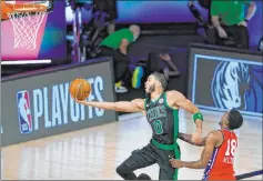  ?? Ashley Landis The Associated Press ?? Boston’s Jayson Tatum beats Philadelph­ia’s Shake Milton for two of his career-playoff high 32 points in Monday’s 109-101 victory.