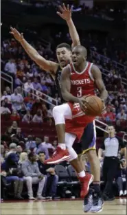  ?? ASSOCIATED PRESS FILE ?? Rockets guard Chris Paul shoots in front of Warriors guard Klay Thompson earlier this season.