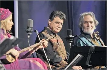  ?? Kamran Jebreili Associated Press ?? ‘ GREAT AND TRUE AMBASSADOR OF I RAN’ Mohammad Reza Shajarian, center, shown performing in Dubai in 2011, was forced to perform only abroad after challengin­g the disputed 2009 reelection of hard- line President Mahmoud Ahmadineja­d.