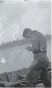  ??  ?? Tom Thomson fishing in Algonquin Park, where he died 100 years ago.