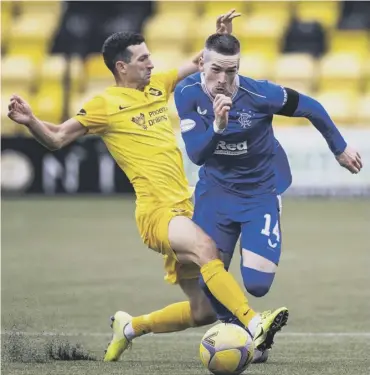 ??  ?? 0 Ryan Kent, pictured in action against Livingston, will likely leave Rangers if his valuation is met.