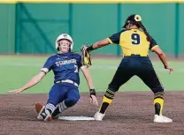  ??  ?? Goode was tagged out by Brennan’s Gabriela Banda on this play, but the Panthers advanced to their ninth regional semifinal.