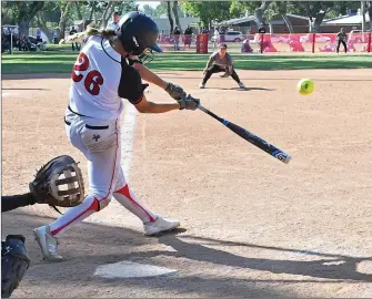  ?? Jayne Karmin-Oncea / For The Signal ?? Hart’s Abby Sweet doubles in the sixth inning against Patriot of Riverside. Hart won 9-8 on Sweet’s walkoff home run in the bottom of the seventh inning. Hart plays Ayala at home on Tuesday.