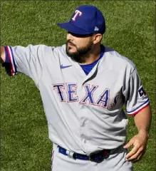  ?? Associated Press file photo ?? During his last 11 games, Martín Perez pitched to a 1.50 ERA and had a .198 batting average against in 24 innings.