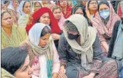  ??  ?? Priyanka Gandhi Vadra with family members of Navreet Singh in Uttar Pradesh’s Rampur district on Thursday.