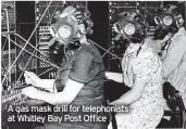  ?? ?? A gas mask drill for telephonis­ts at Whitley Bay Post Office