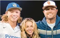  ?? ?? From left, Orioles top draft pick Jackson Holliday poses for a photo with his mother, Leslee, and his father, Matt, a former MLB All-Star. Jackson’s parents and coaches described a “steady,”“even-keeled” and “wellbalanc­ed” player and person who is prepared for what awaits him on his journey from Stillwater, Oklahoma, to Camden Yards.