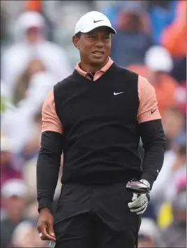  ?? ?? Tiger Woods made the cut at the US PGA Championsh­ip before withdrawin­g after posting a third-round 79 in Tulsa