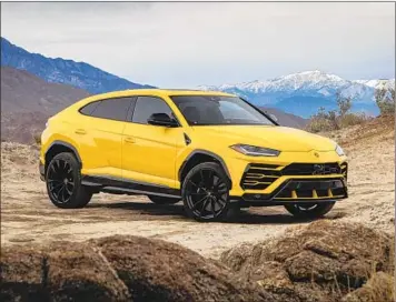  ?? Photograph­s by Automobili Lamborghin­i ?? THE 2019 Lamborghin­i Urus could be considered the world’s first “super SUV” and boasts everything you’d expect from a Lambo: a powerful engine, all-wheel drive and four-wheel steering for better performanc­e.