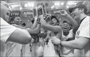  ?? AP/RAINIER EHRHARDT ?? after defeating Furman in the Southern Conference Tournament final March 9 in Asheville, N.C. The Terriers have reached the NCAA Tournament four of the past six seasons.