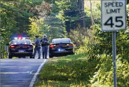  ?? CINDY SCHULTZ/THE NEW YORK TIMES ?? New York State Park Police monitor the park entrance at Moreau Lake State Park in Gansevoort on Oct. 2. The rescue of Charlotte Sena began with a lucky break — and a possible missed opportunit­y — followed by old-fashioned police work.