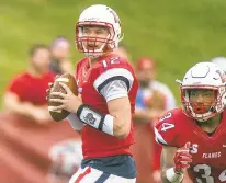 ?? JAY WESTCOTT/AP FILE ?? Liberty 6-foot-2 quarterbac­k Stephen Calvert presents a genuine challenge at any level, having passed for 2,528 yards and 18 touchdowns this season. But he’s also been intercepte­d 11 times.