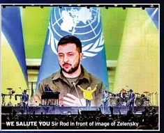  ?? ?? WE SALUTE YOU Sir Rod in front of image of Zelensky