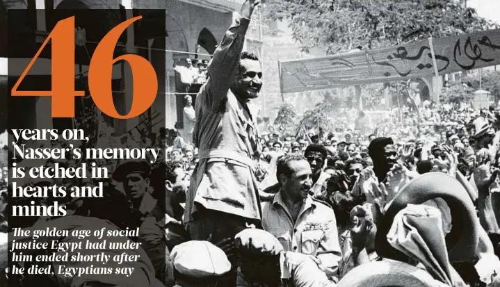  ?? AP ?? Above: Egyptian prime minister Jamal Abdul Nasser waves to cheering supporters as he moves through Port Saeed on June 18, 1956 to raise the Egyptian flag over the Navy House. Flagraisin­g was part of the ceremony in which Egypt formally took over...