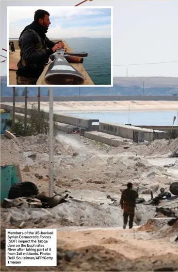  ??  ?? Members of the US-backed Syrian Democratic Forces (SDF) inspect the Tabqa dam on the Euphrates River after taking part of it from Isil militants. Photo: Delil Souleiman/AFP/Getty Images