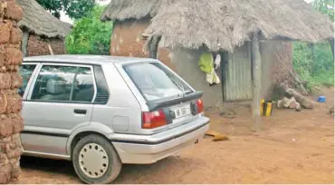  ??  ?? The king’s car, an aging saloon, was parked behind a nearby hut