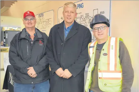 ?? SUEANN MUSICK/THE NEWS ?? Don MacKenzie, left, president of Local 440 Unifor, and Angus Pellerin, right, vice president of Local 440, met with Kings North MLA John Lohr during a tour of Northern Pulp on Friday. Lohr toured the plant to show his support to the forestry industry...