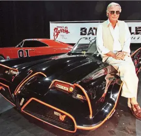  ?? — Reuters ?? In this 1999 file photo, West posed atop the original Batmobile used in the hit series Batman.