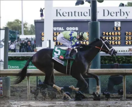  ?? MORRY GASH — THE ASSOCIATED PRESS ?? John Velazquez rides Always Dreaming to victory in the 143rd running of the Kentucky Derby horse race at Churchill Downs Saturday in Louisville, Ky.