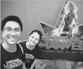  ??  ?? Paolo Cari, Globe At Home customer, and his friend Tricia Garcia at Captain Marvel Singapore fan meet event