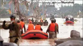 ?? PTI ?? Rescue operation is underway following a heavy rain in Kumamura, Kumamoto prefecture, southern Japan Sunday