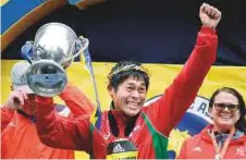  ?? AP ?? Yuki Kawauchi hoists the trophy after winning the 122nd Boston Marathon on Monday.