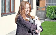  ??  ?? Woman’s best friend: comedian Catherine Tate and a bulldog