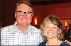  ?? NWA Democrat-Gazette/CARIN SCHOPPMEYE­R ?? Joey Walters, Arkansas Activities Associatio­n deputy director, and Rhonda Fincher visit at the Beat the Heat luncheon July 27.