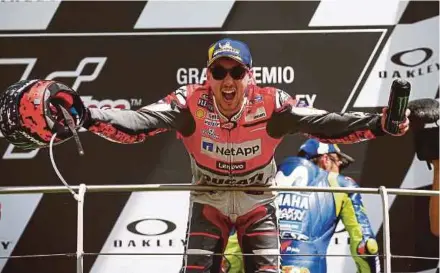  ?? REUTERS PIC ?? Ducati’s Jorge Lorenzo celebrates on the podium after winning the Italian Grand Prix in Mugello yesterday.