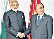  ?? PTI ?? PM Narendra Modi with his Vietnamese counterpar­t Nguyen Xuan Phuc in Manila on November 2017.