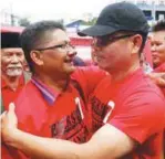  ??  ?? ... Red Shirts leader Datuk Seri Jamal Yunos (right) being embraced by a supporter on his release on police bail yesterday. Jamal said he plans to launch 'Bersih 7' to clean up the Pakatan Harapan government in Selangor.